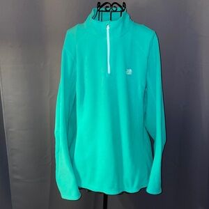 The North Face women’s size XL/TG.  100% polyester.